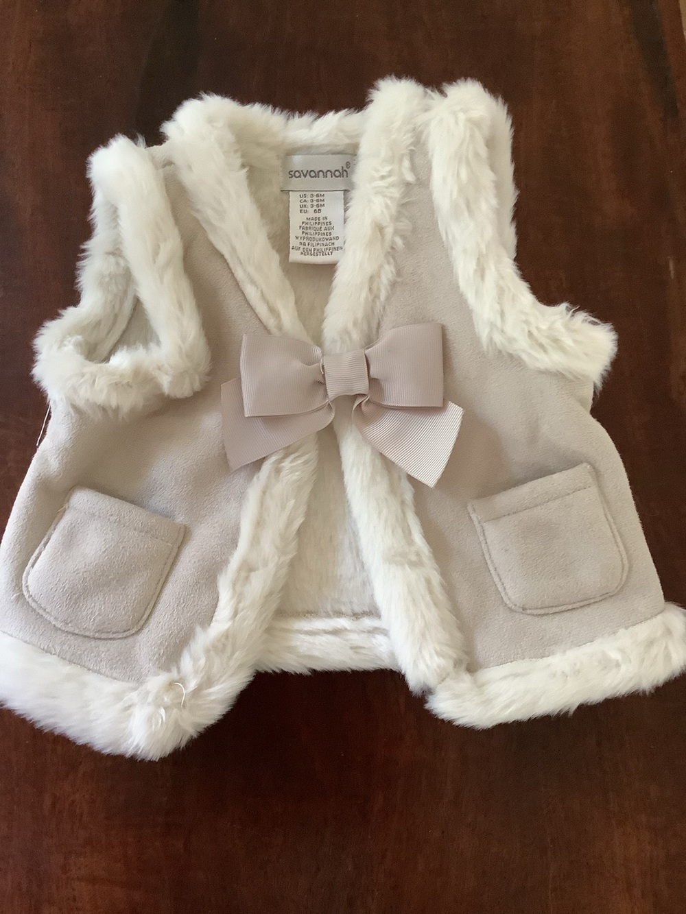 Savannah Cream and White Faux Fur-Trim Baby Vest with Bow